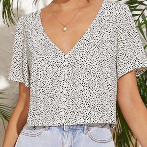 white speckled top